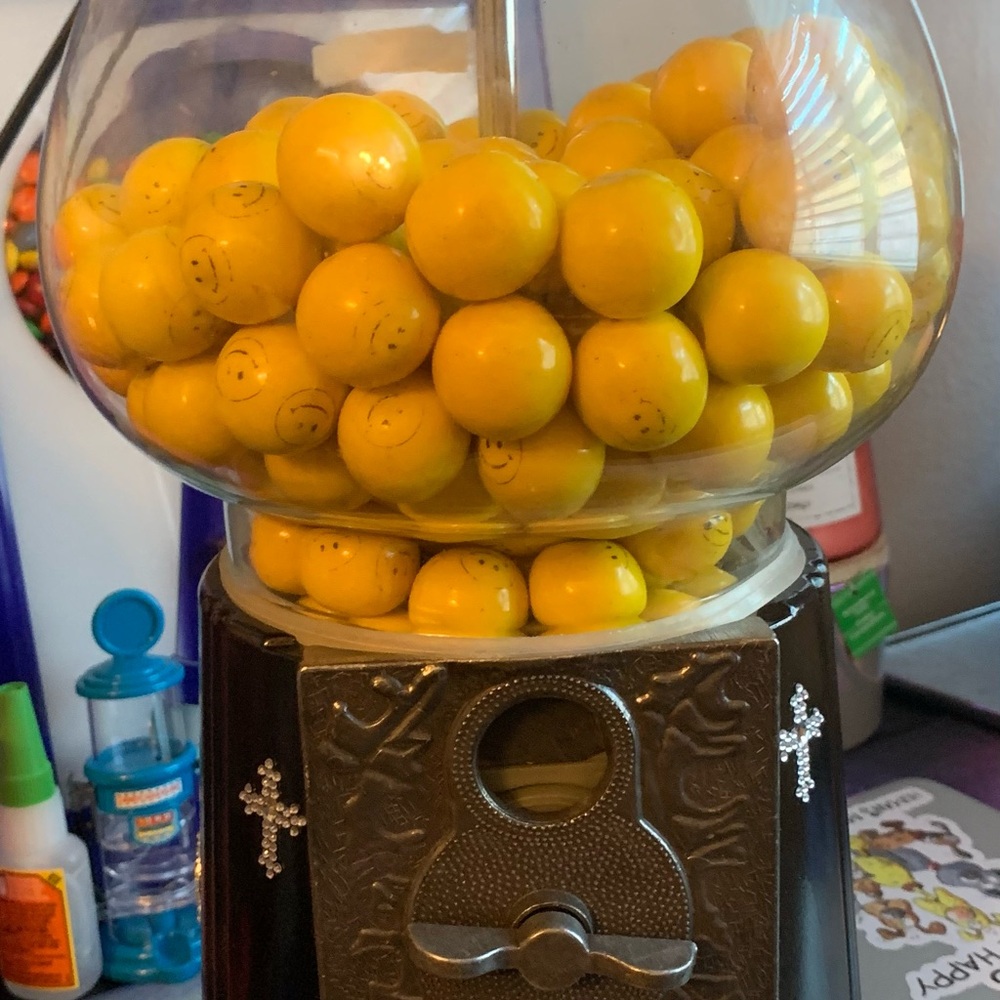 Vintage Gumball Machine with Yellow Gumballs